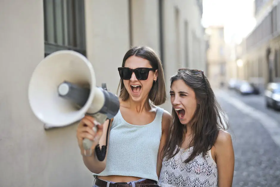 Illustration of hands holding a megaphone and a speech bubble representing earned media's role in marketing success.