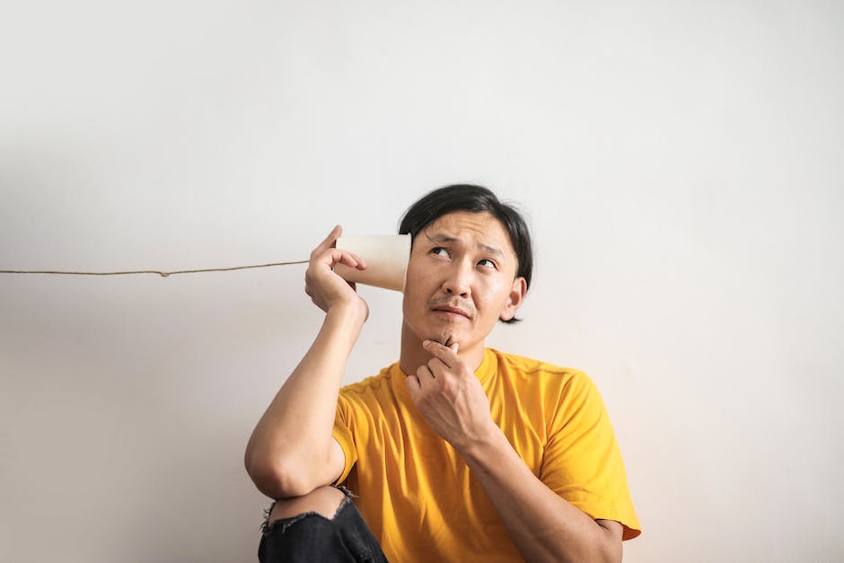 Illustration of a person looking at a thought bubble with subconscious cues like arrows, stars, and dollar signs