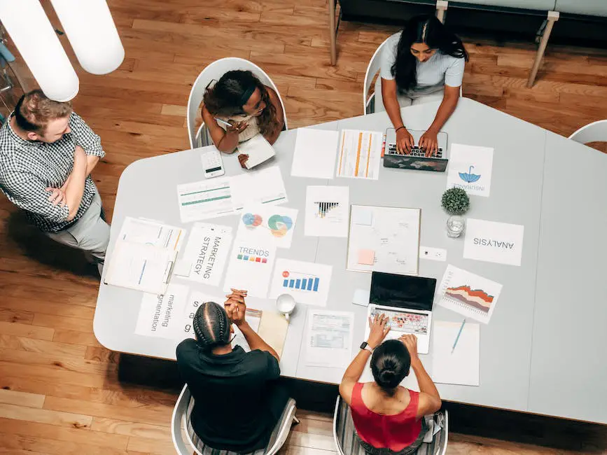 An image showing a group of people working together in an office, symbolizing operational excellence in marketing strategy.